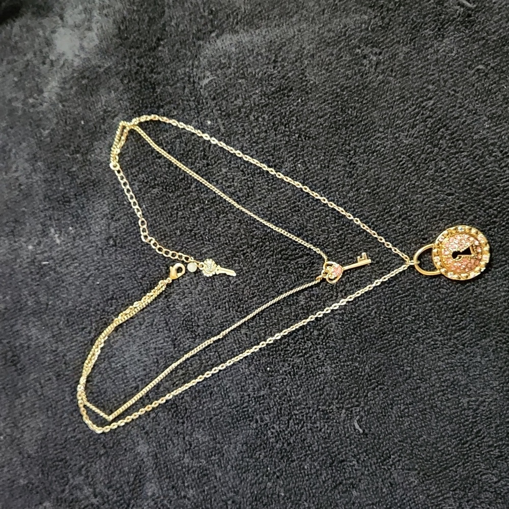 Gold pink stone padlock and key design pendent Betsy Johnson necklace